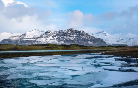 ice and mountains with blue skies in Iceland