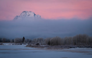 pink sunrise over snake river grand tetons