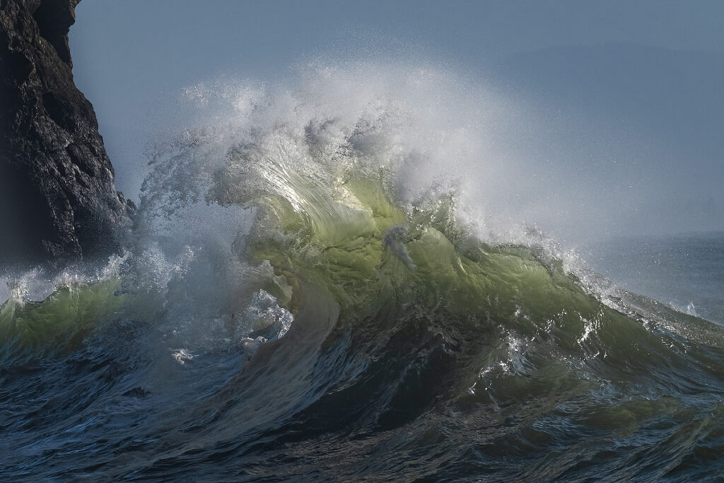 Waves in the ocean creating unique abstract shapes