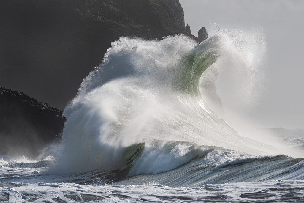 Waves in the ocean creating unique abstract shapes