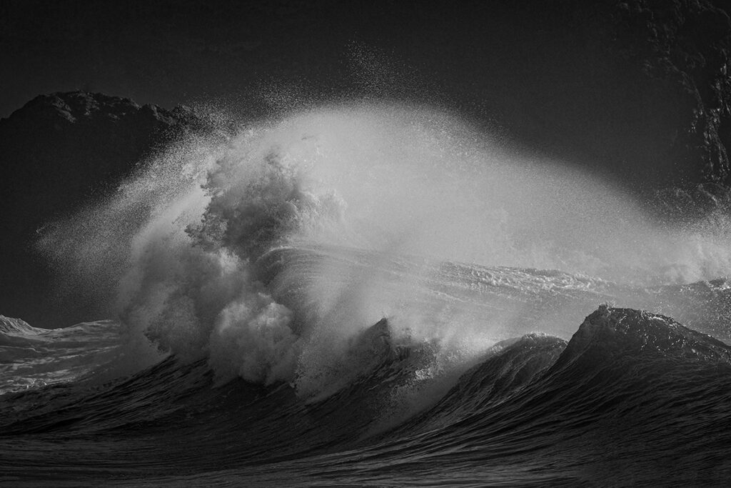 Waves in the ocean creating unique abstract shapes