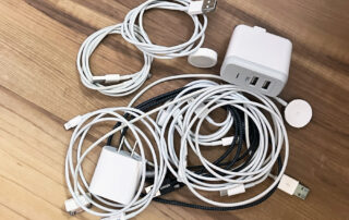 Tangle of charging cords for portable electronics